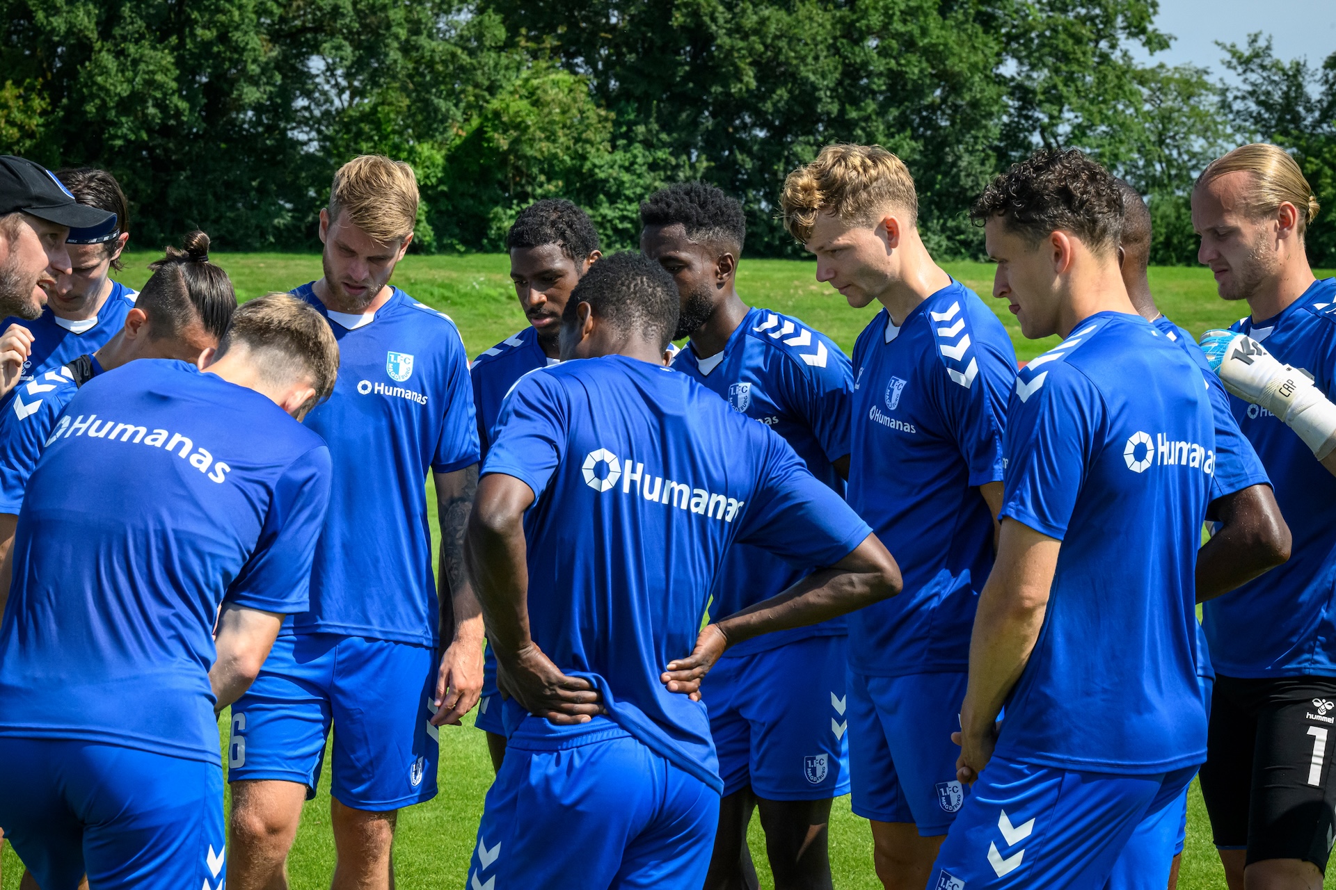 Mannschaftskreis im Trainingslager