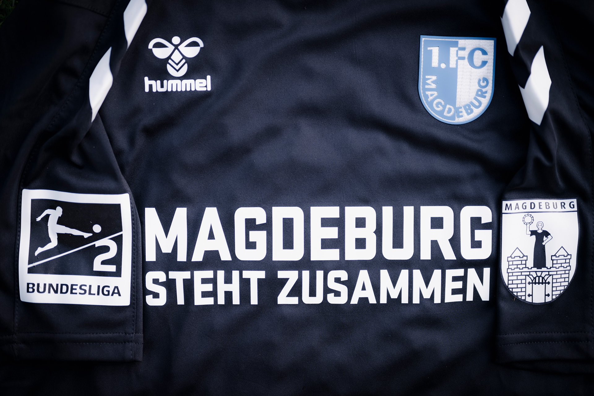 Logo Magdeburg steht zusammen