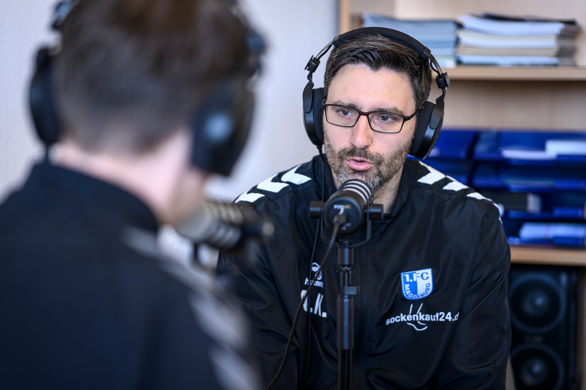 André Kilian am Podcast-Mikrofon